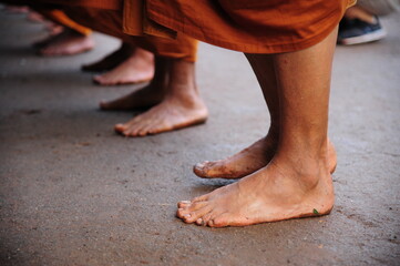 Monks walking alms round Thailand