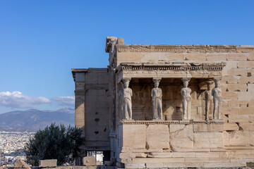 Erechtheion, Temple of Athena Polias on Acropolis of Athens, Greece. View of The Porch of the Maidens with statues of caryatids