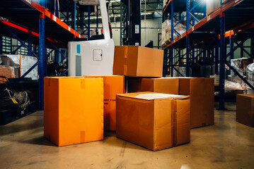 Fototapeta na wymiar Cardboard boxes in warehouse factory