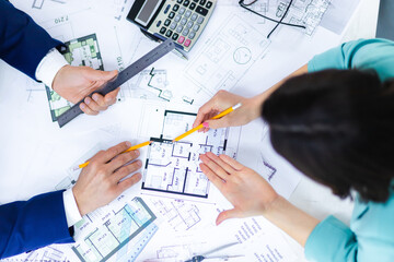 Close up photo of hands working with papers at office.