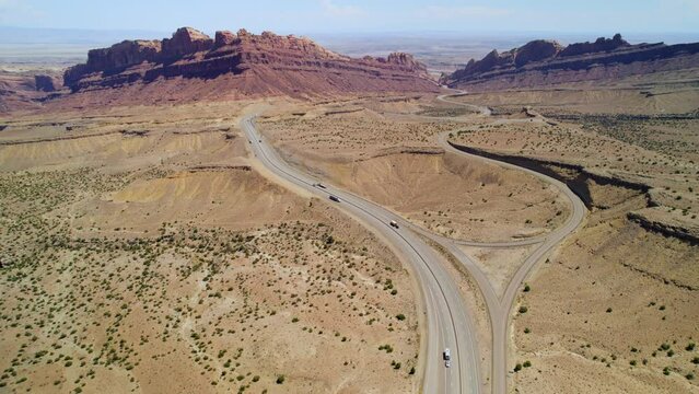 Aerial view of Spotted Wolf Canyon in Utah state on interstate 70. Traffic in Black Dragon Canyon I-70 during a great weather.