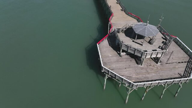 Damage to fishing pier from Hurricane Ian storm surge at Cherry Grove Beach North Myrtle Beach South Carolina vacation destination