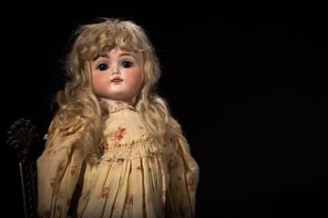 An original antique 1887 Bisque Doll handed down through three generations of family.