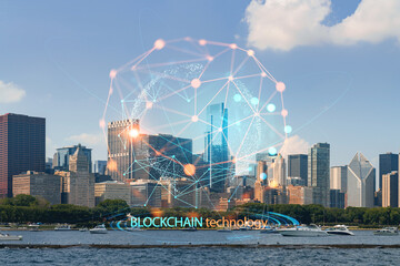 Fototapeta premium City view of Downtown skyscrapers of Chicago skyline panorama over Lake Michigan, harbor area, day time, Chicago, Illinois, USA. Decentralized economy. Blockchain, cryptography concept, hologram
