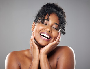 Beauty, skincare and hands on face of woman in studio for health, wellness ad grooming against...