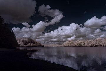 infrared photography - ir photo of landscape under sky with clouds - the art of our world in the infrared spectrum