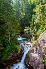 Fototapeta na wymiar A small waterfall in the Tatra Mountains