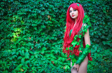 Portrait of Sexy Superhero Female Cosplay Character with red hair