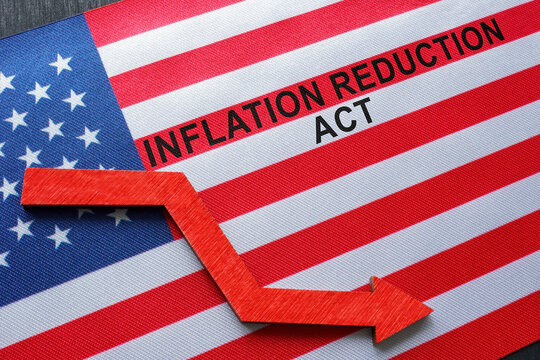 American flag with an arrow and an inscription Inflation reduction act.