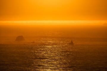 Naklejka na ściany i meble Sunset, golden wave, Pacific ocean, California USA