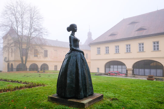 Ratiborice, Czech Republic - October 19, 2022: Monument of writer Bozena Nemcova in Ratiborice by Ceska Skalice, Czech Republic. Defocused