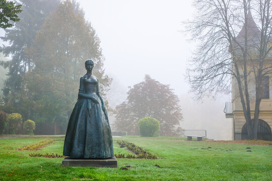 Ratiborice, Czech Republic - October 19, 2022: Monument of writer Bozena Nemcova in Ratiborice by Ceska Skalice, Czech Republic. Defocused
