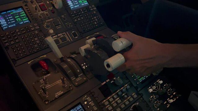 Jet pilot starting un right engine during push-back. Night view.
