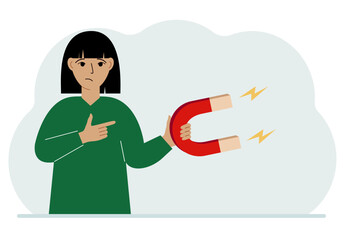 A woman holds a huge magnet in his hand, attracts new customers, money and ideas. Inbound business marketing technologies, lead generation concept.