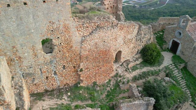 Ruined castle in Europe aerial footage cinematic medieval era  Crane plan, Palafolls Barcelona