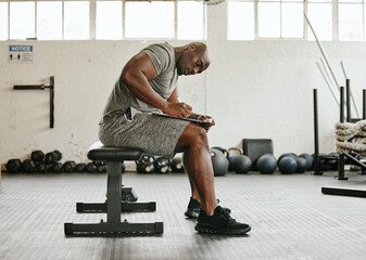 Gym membership, personal trainer and black man writing on clipboard for exercise, training or...