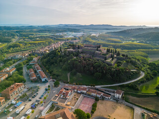 Fototapeta na wymiar Aerial drone footage of Hostalric European medieval town in the mountains castle Church Cathedral trekking tourism a few minutes from Blanes and the Costa Brava