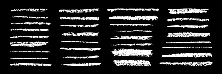 Chalk grunge strokes and borders set. White chalk sketches. Grunge strokes, lines and curves collection. Chalkboard hatches and scribbles.