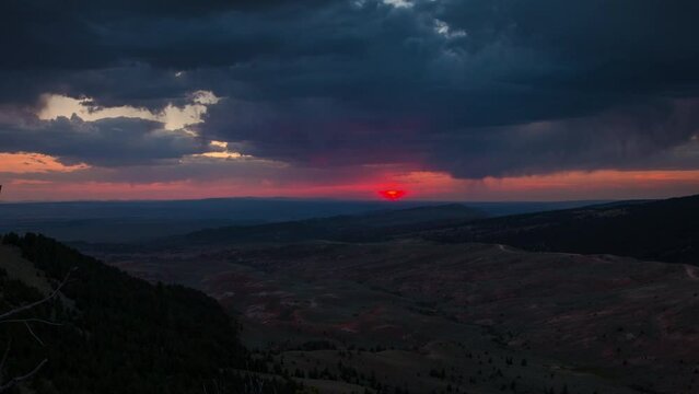 Time-lapse of a blazing sunset shot over the high plains of central Wyoming near Casper. 4K