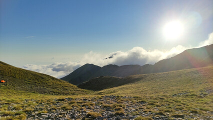 Camping at the mountain. mountain scenery with sun and clouds.  Profitis ilias mountain in greece lakonia