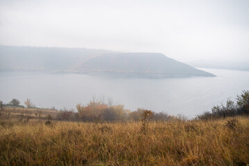 Foggy river with cliff landscape