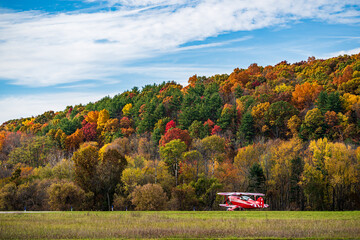 autumn landscape at the Airport with a plane taxing