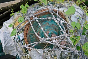 rope knotting around some engine part of boat 