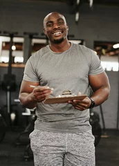 Rolgordijnen Gym membership, personal trainer and black man holding sign up clipboard for heath and wellness subscription for healthy lifestyle. Portrait of happy male coach holding paperwork to join fitness club © S Fanti/peopleimages.com
