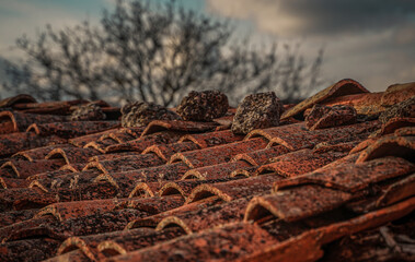 Rustic red tile roof in an old village in Spain, Vintage style, Old village house in Burgos