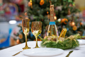 Table served for Christmas dinner. Christmas And New Year Holiday Table Setting. Celebration