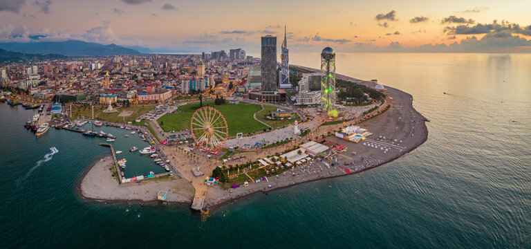Panoramic aerial view of Batumi, Georgia. The Ferris Wheel and the Alphabet Tower are in the foreground.