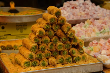 Turkish baklava. Eastern market, counter. Arabic dessert made from honey and syrup. Oriental sweets...
