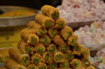 Turkish baklava. Eastern market, counter. Arabic dessert made from honey and syrup. Oriental sweets...