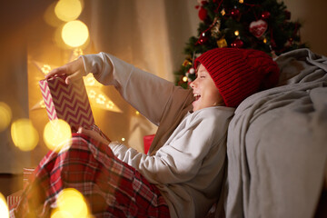 Kid reaction to Christmas Day gift opening New Year card adorable character Gifts giving tradition