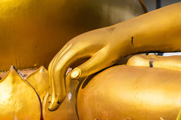 Hand Buddha statue is a symbol of Buddhism showing the peace of mind and faith.