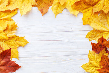 Autumn Leaves over wooden background. Autumn leaves frame