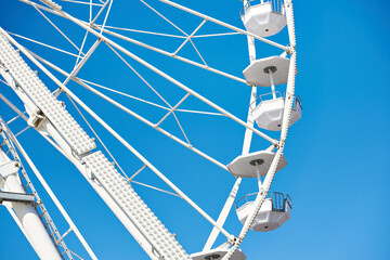 Ferris wheel on blue sky