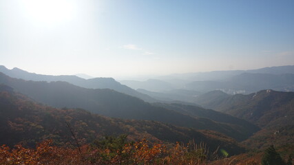 Bukhansan National Park. Mangwolsa Temple. autumn mountains. hiking Korean mountains. mountain landscapes in autumn. trekking. rise to the top of the mountain. fine dust in Korea