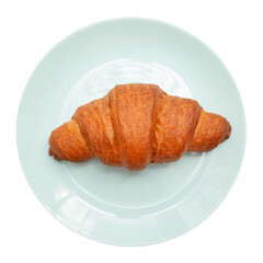Croissant on a plate. Isolated on white background. Delicious snack.