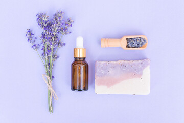 Natural lavender self-care products - cosmetic lavender oil or face serum and handmade soap or...