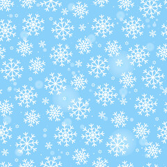Seamless pattern white snowflakes on blue background. Happy New Year.