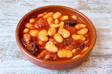 clay pot with Asturian bean stew