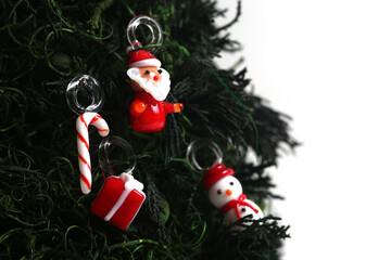 Christmas concept - decorated fake fir tree extreme close up