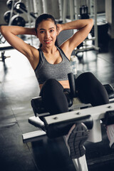 Fototapeta na wymiar Asian woman exercise at gym for good healthy in fitness, Lifestyle and sport concept.