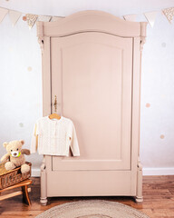 Wardrobe after renovation painted in beige color