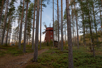 mill in a forest, autumn