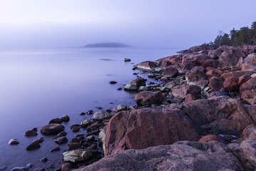 Fototapeta na wymiar Rocky coast at sunset, Finland.