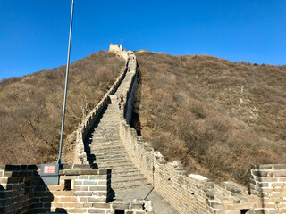 Mutianyu, China, November 2016 - A building with a mountain in the background