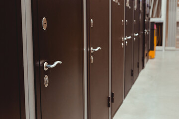 Obraz premium Exterior door samples at a door showroom or hardware store