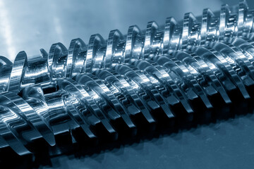 Close up scene of injection screw spate parts.